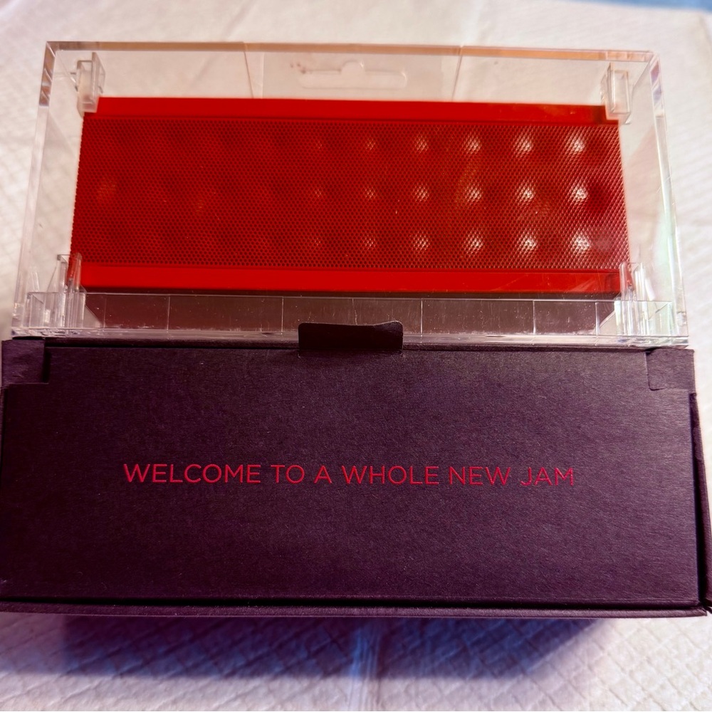 Mini Red Jambox by Jawbone compact. Bluetooth, wireless speaker.
